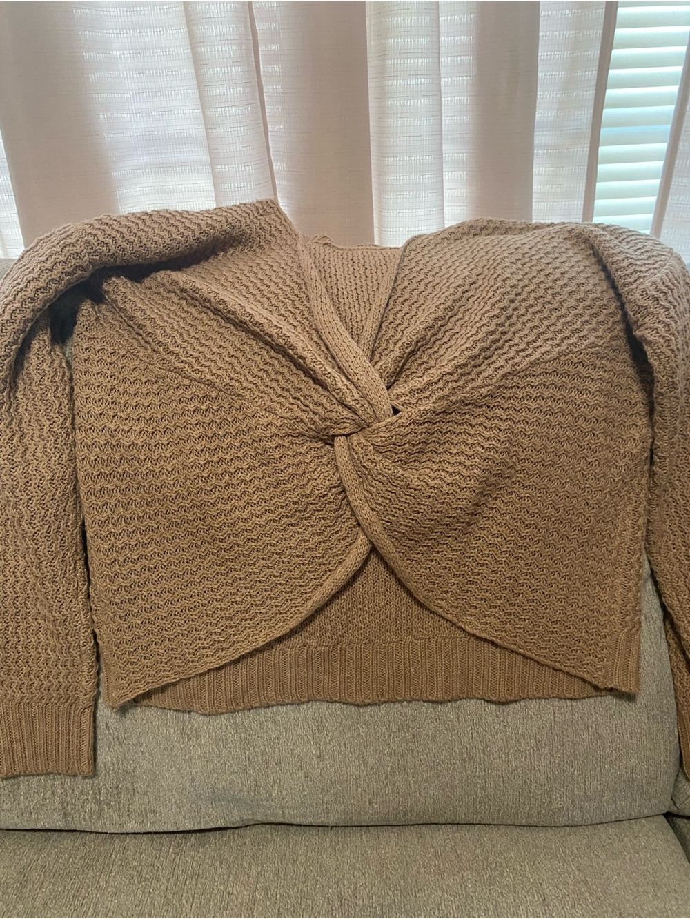 Off-the-Shoulder Twist-Front Knit Sweater in Camel